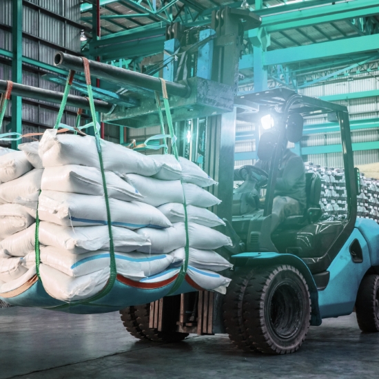 Machinery Moving a Load of Grain